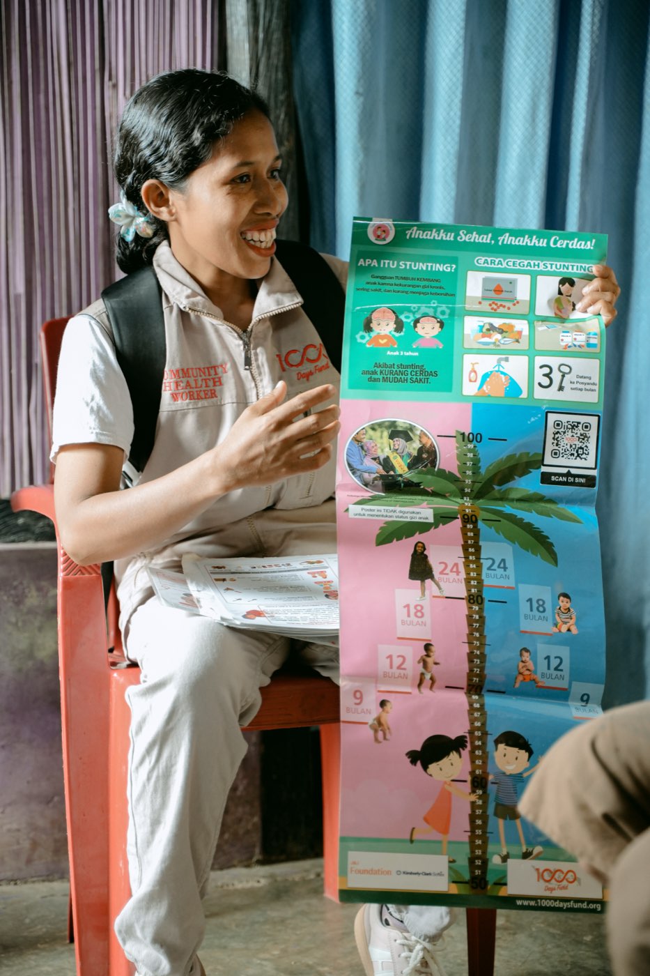 A child in East Nusa Tenggara being measured for signs of stunting.